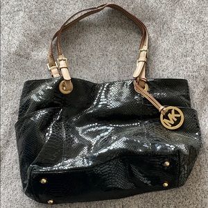 Black snakeskin Michael Kors purse